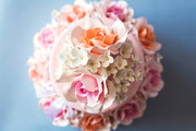 Cake decorated with flowers on a blue background featuring cake, flower