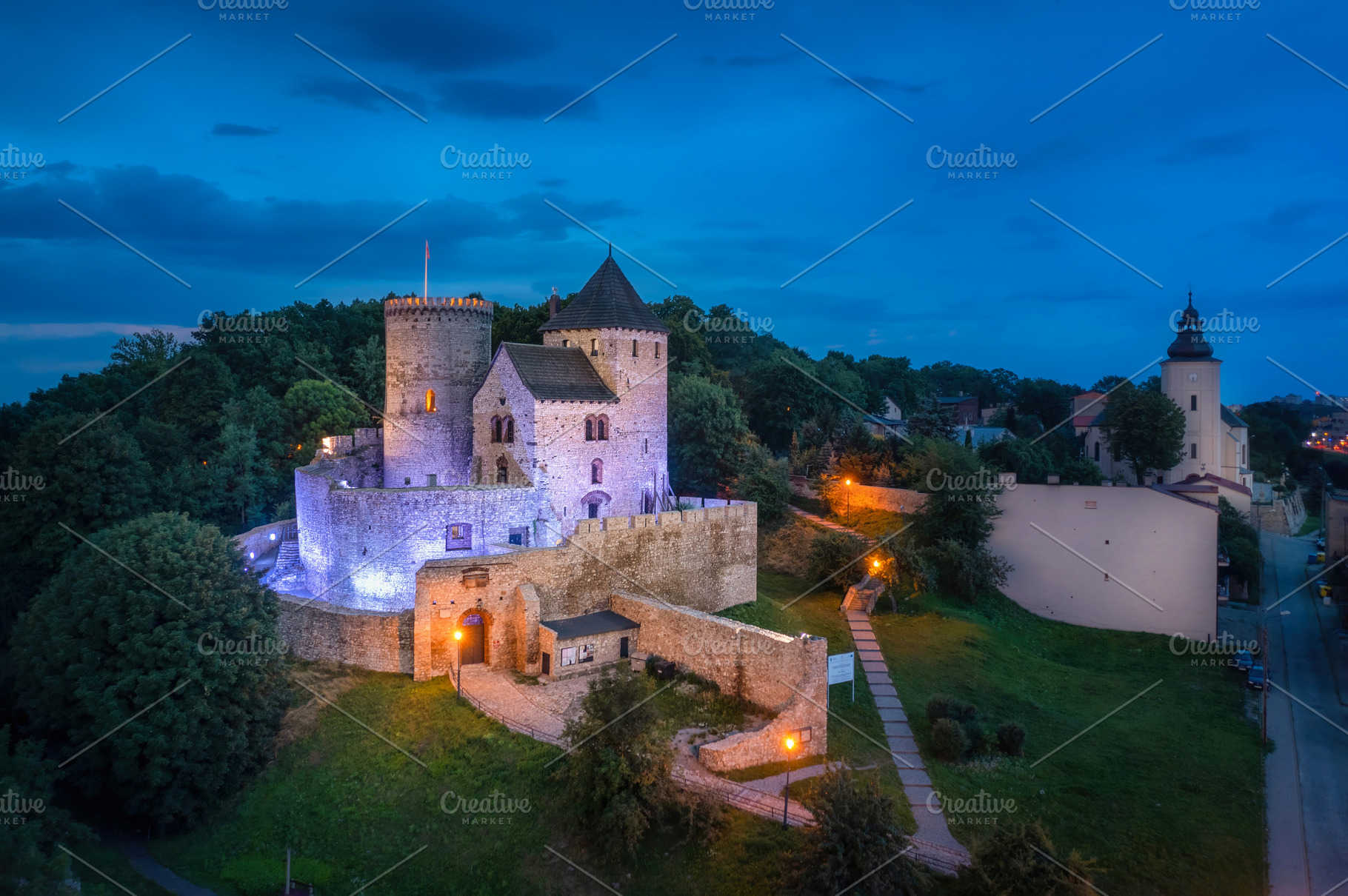 Castle at dusk in Bedzin, Poland | Architecture Stock Photos ~ Creative