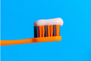 Toothbrush on a hygienic concept | Background Graphics ~ Creative Market