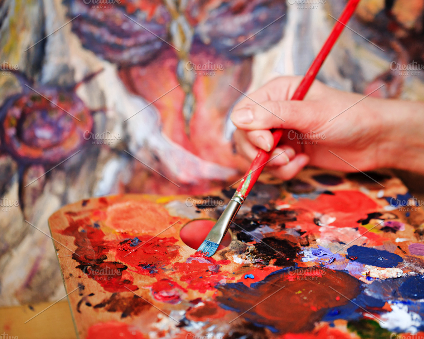 artist-s-hand-paint-a-picture-featuring-artist-oil-and-palette-arts