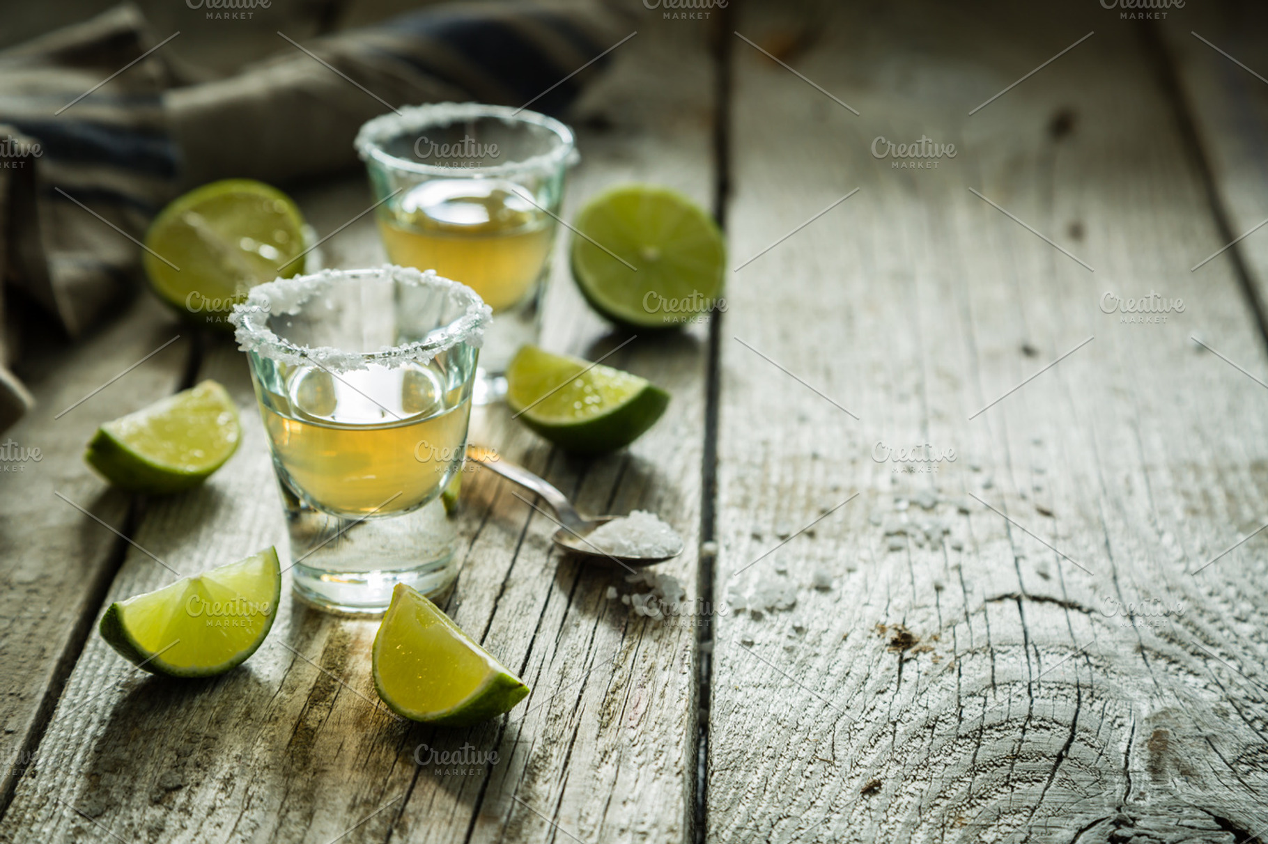 Gold tequila shots on rustic wood background | High-Quality Food Images ...