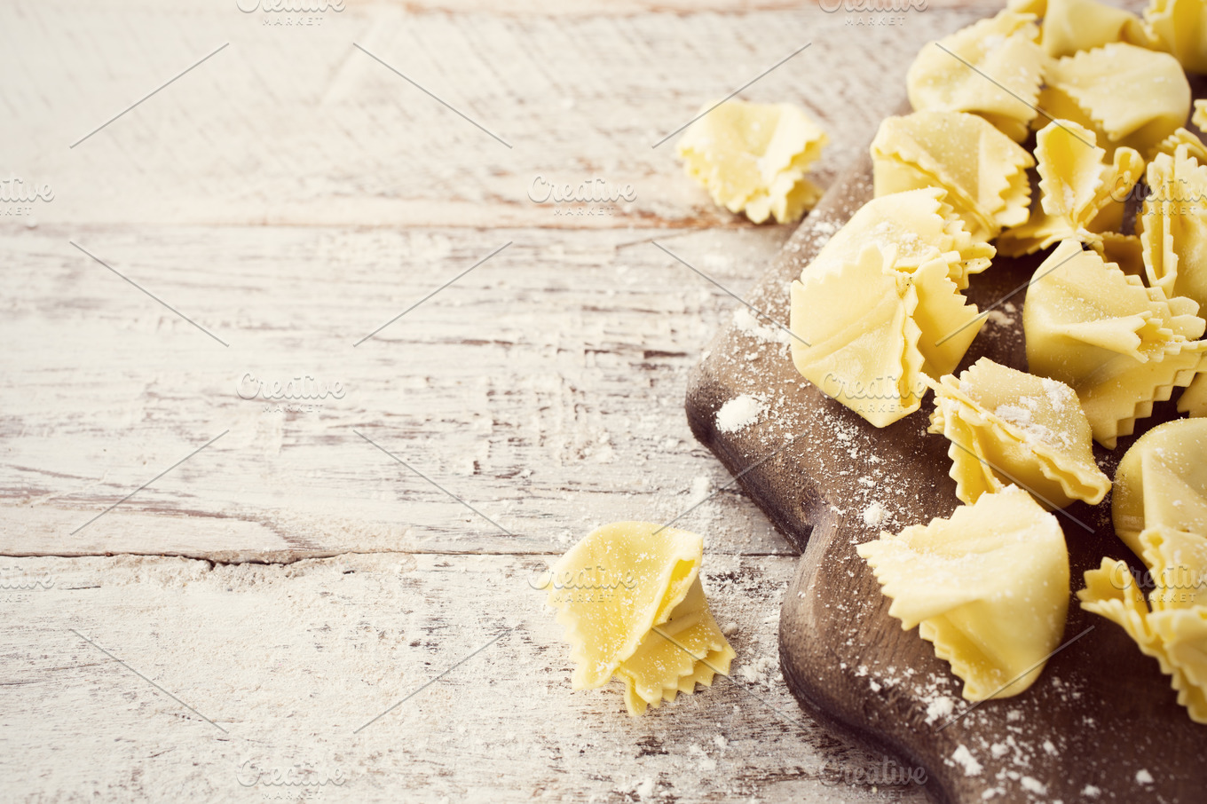 Homemade raw italian saccottini with green pesto featuring pasta, saccottini  | Food Images ~ Creative Market