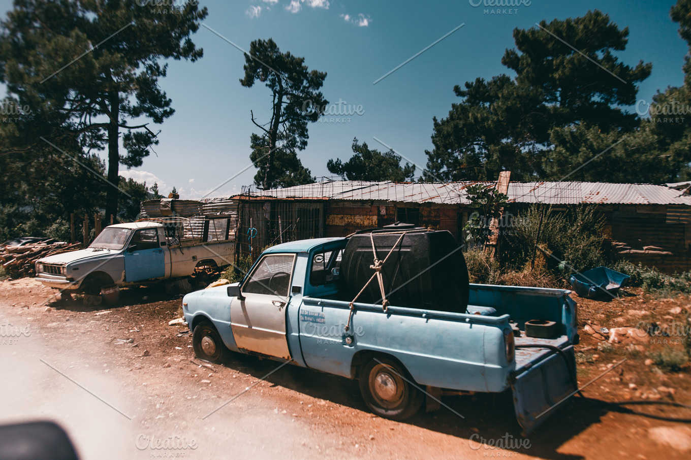 Abandoned cars on island | Nature Stock Photos ~ Creative Market