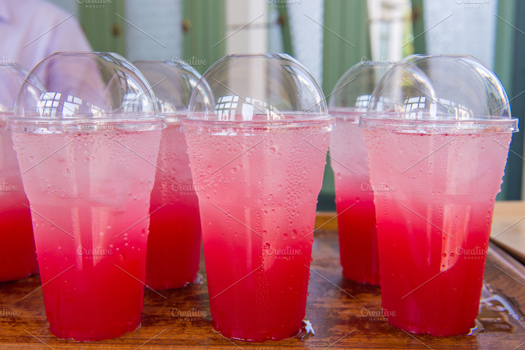 Soda Soft Drinks In Plastic Cups Containing Drink Strawberry And Pae