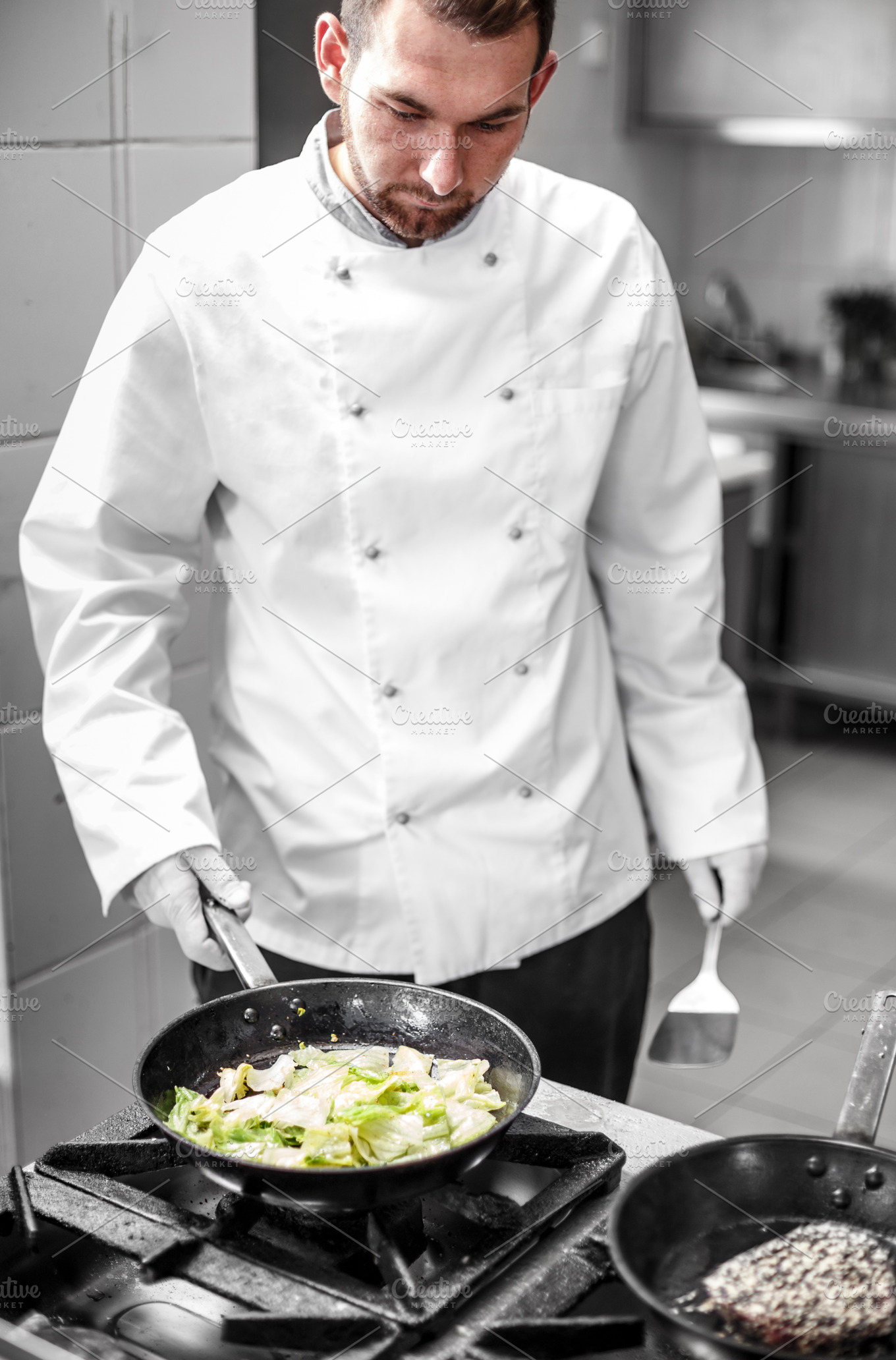 Chef is chopping vegetables Stock Photo by grafvision