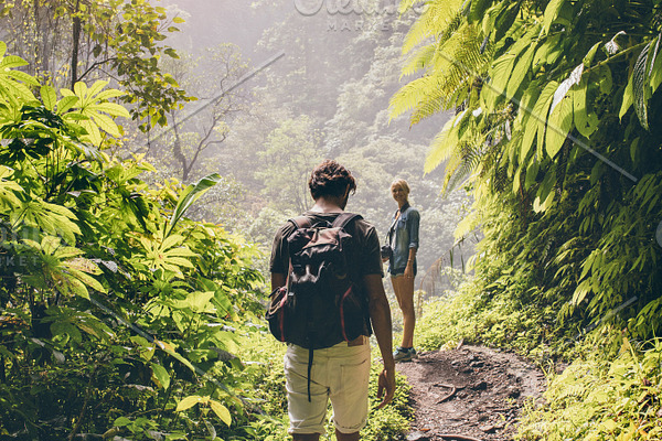 People Hiking In Tropical Jungle Featuring Adult Adventure And Backpack High Quality People