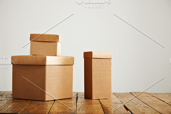 Download Mockups Of Blank Brown Corrugated Cardboard Boxes Stock Photo Containing Box High Quality Business Images Creative Market