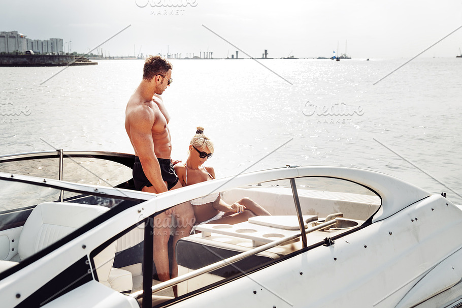 Elegant Beautiful Couple On Boat In A Swim Wear High Quality