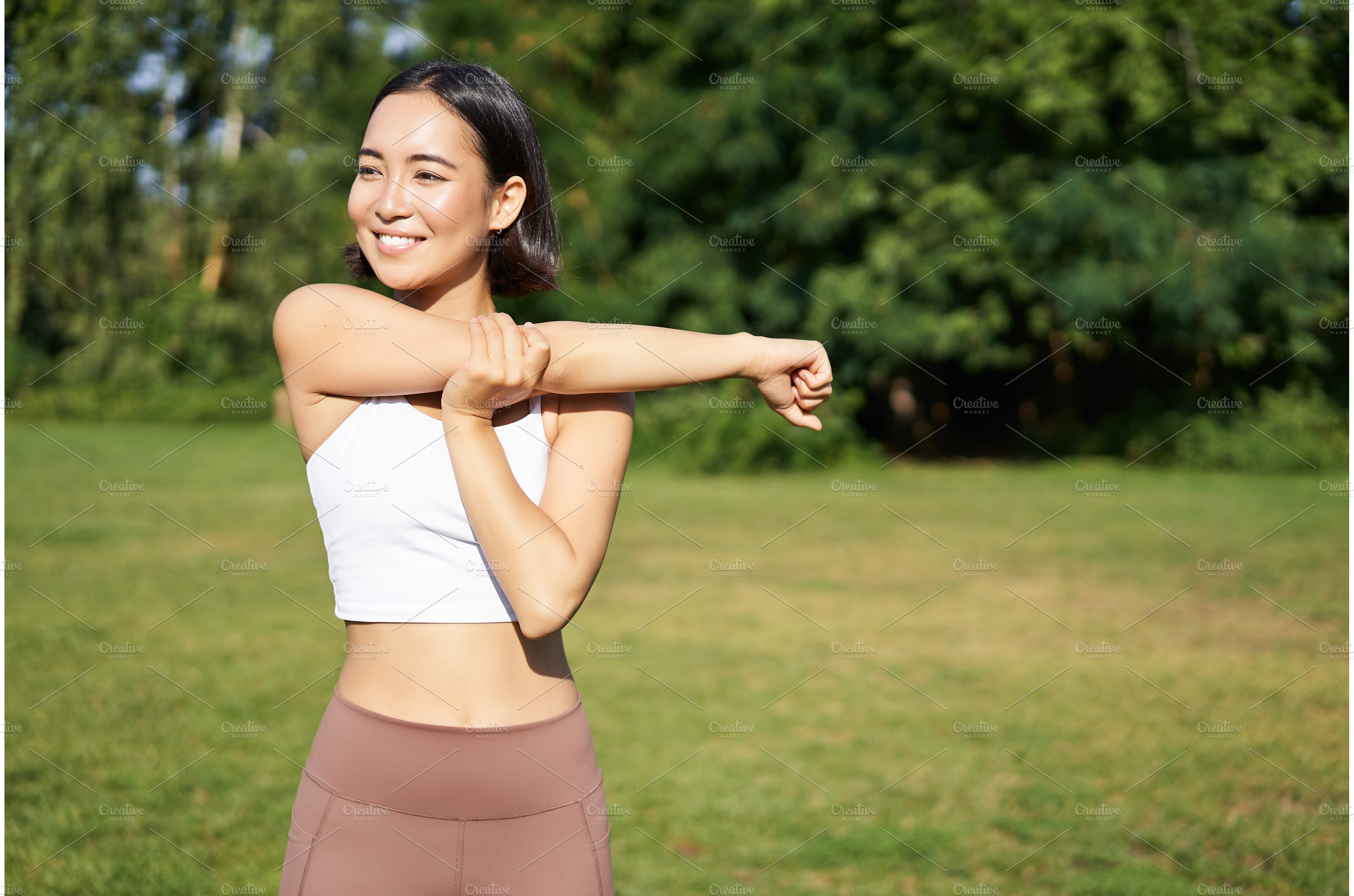 young woman stretching before Fitness and Exercise