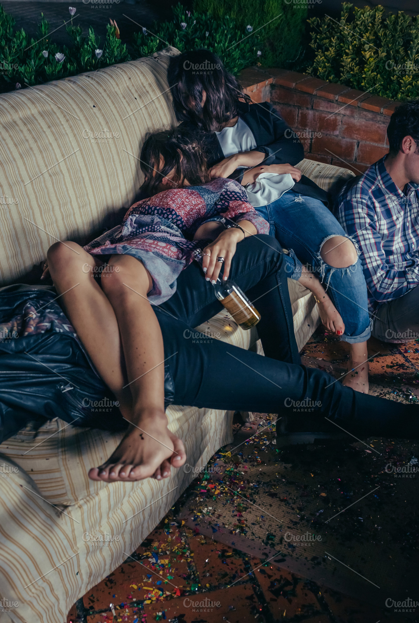 Young Drunk Friends Sleeping In A Sofa After Party Featuring Millennial