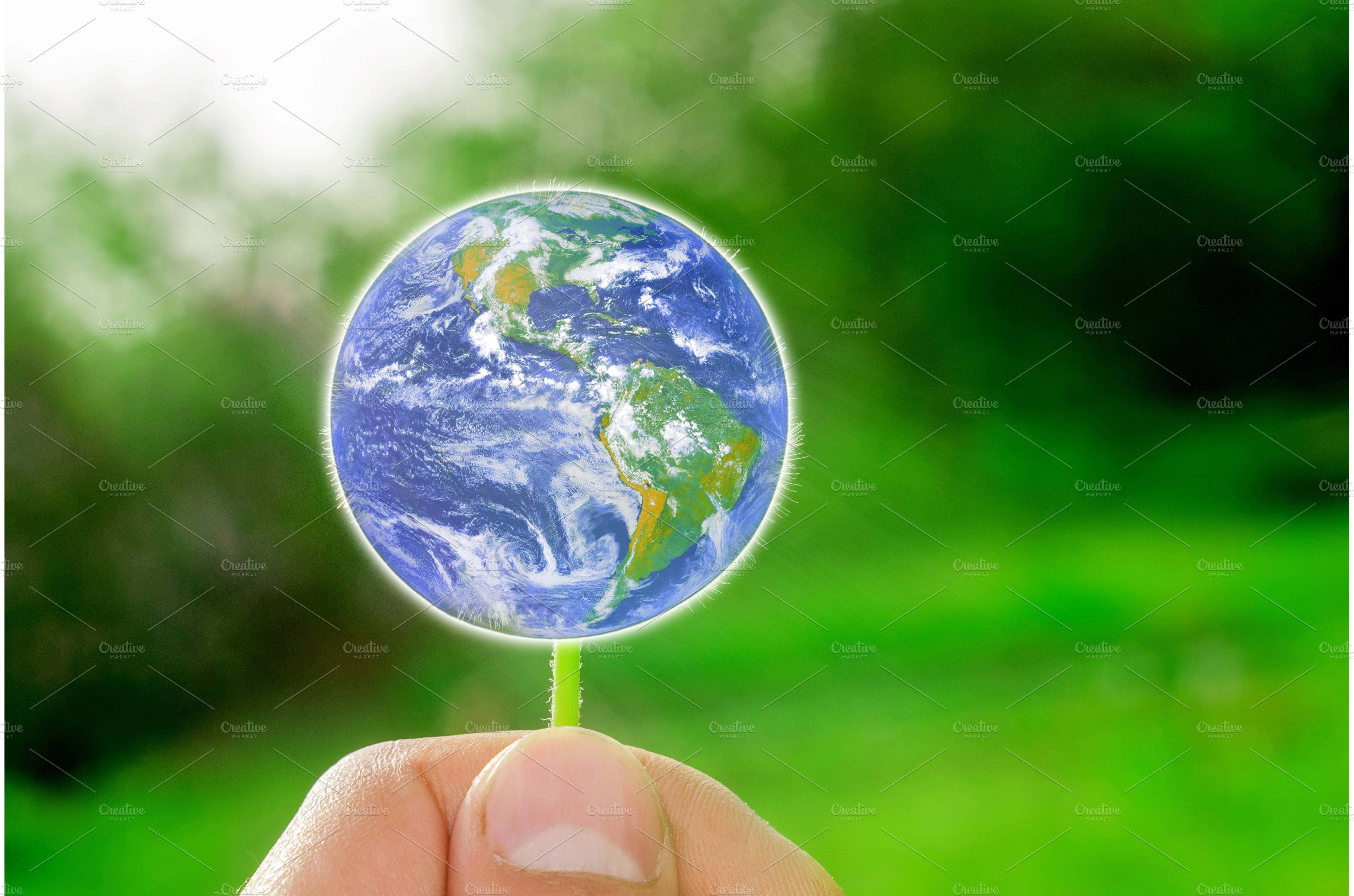 planet-earth-in-hand-earth-day-nature-stock-photos-creative-market