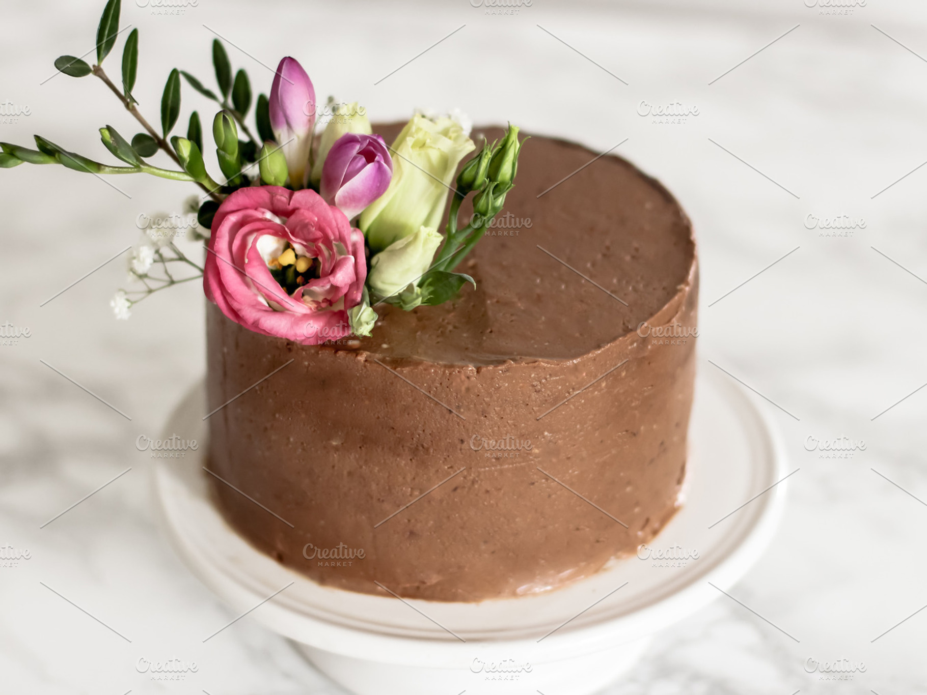 Chocolate cake with flowers stock photo containing photography and