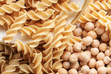 Colorful Pasta, Loop Noodles, Italian Pasta, Farfalle, Fusilli, Penne and  Others on a White Tablet Against a Neutral Background. Stock Photo - Image  of carbohydrates, decoration: 162951908