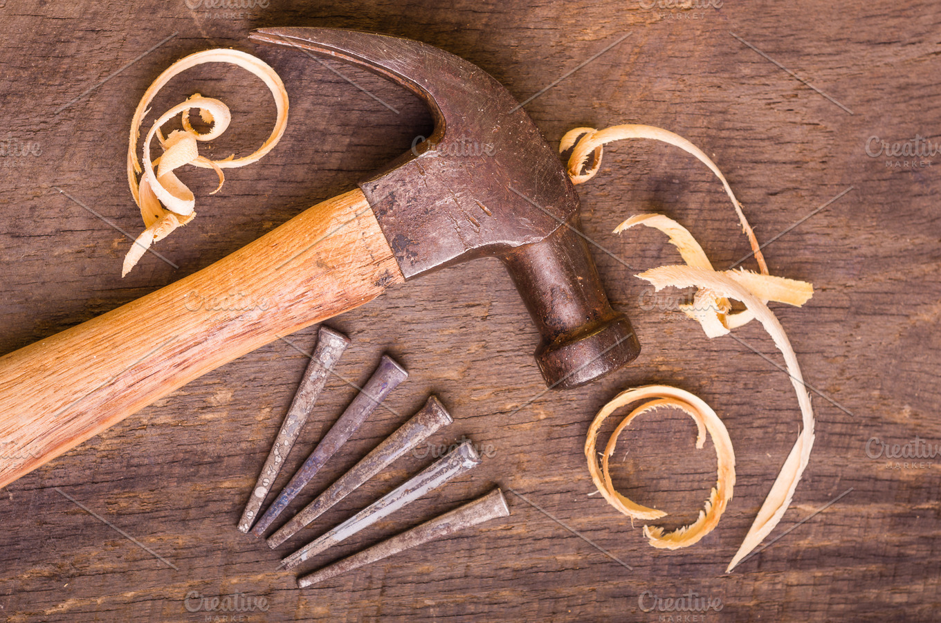 Hammer and nails featuring hammer, nail, and nails Business Images