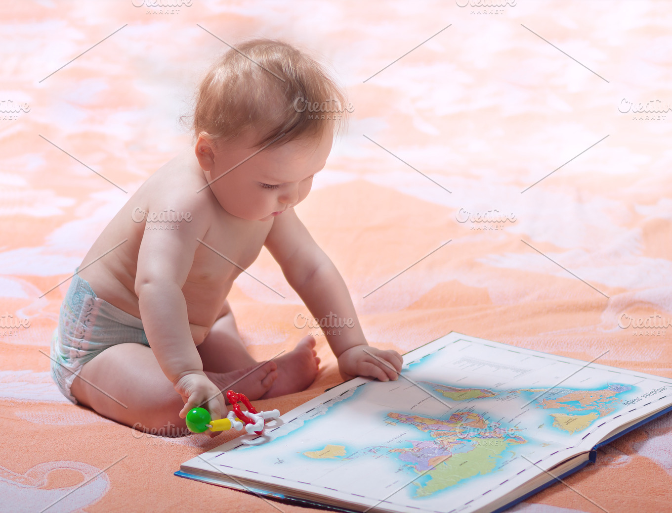 Toddler with maps featuring baby, smiling, and childhood | People ...