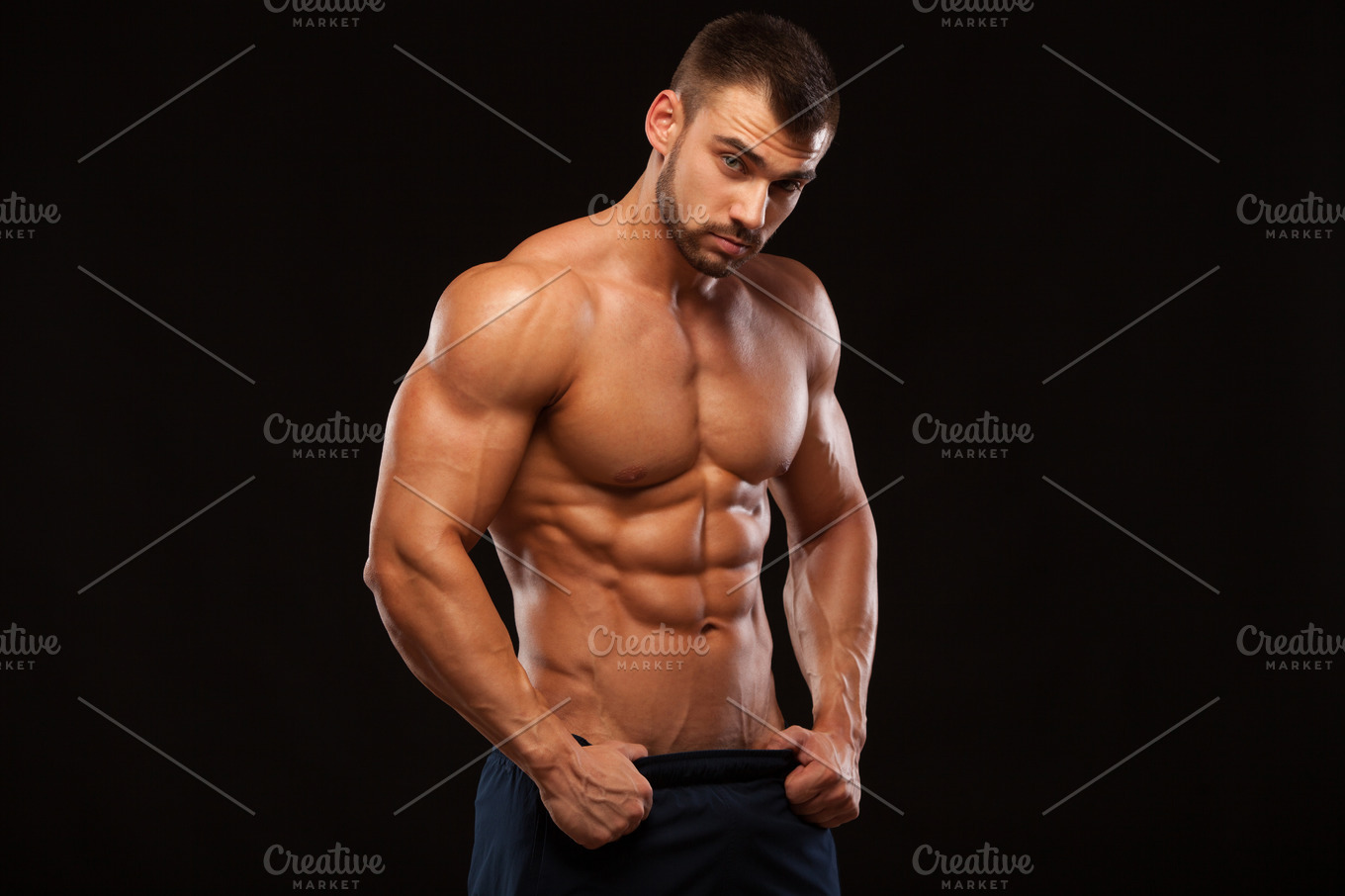 Strong Athletic Man - Fitness Model showing Torso with six pack abs ...