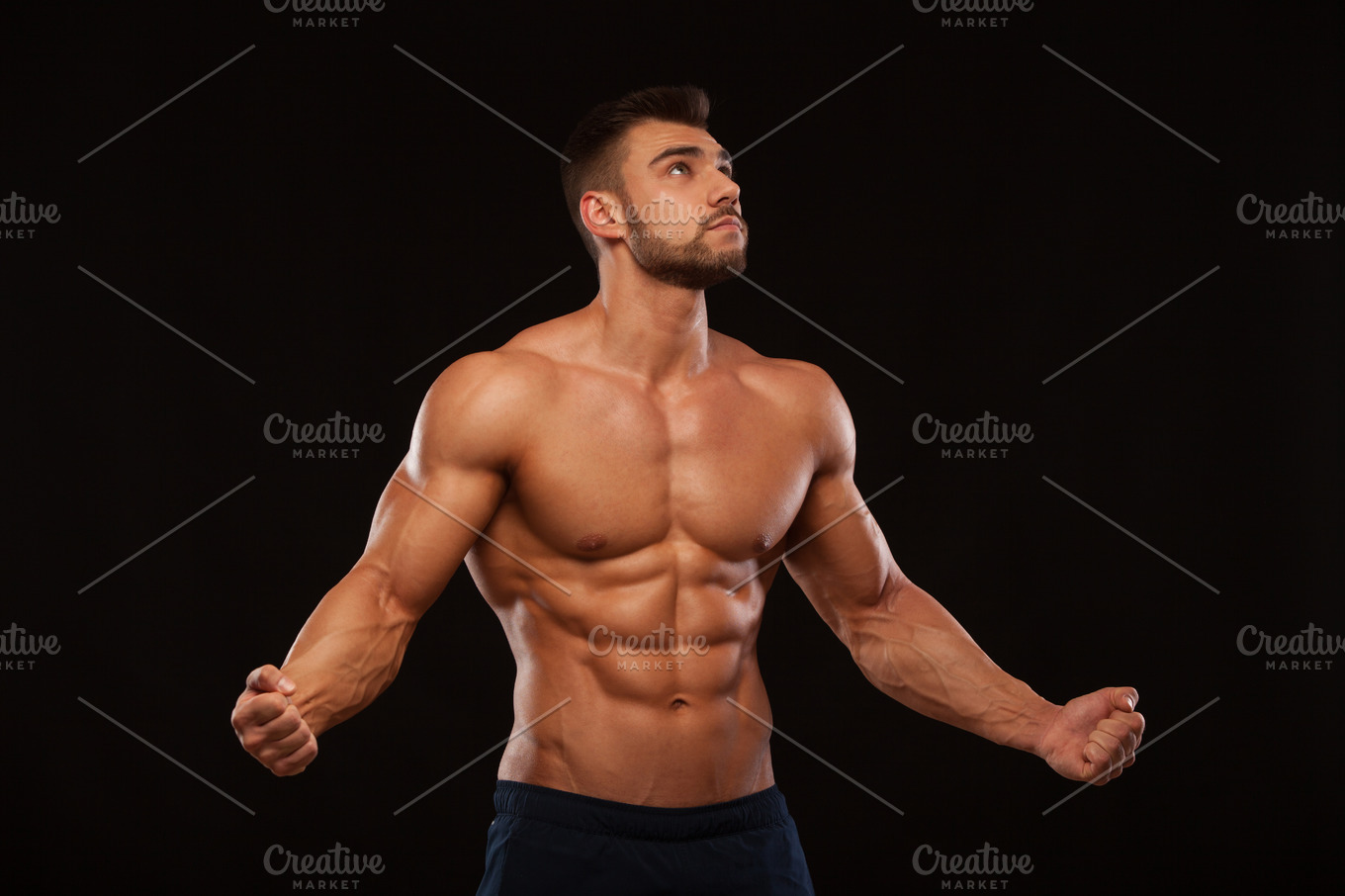 Strong athletic man fitness model torso showing six pack abs isolated ...