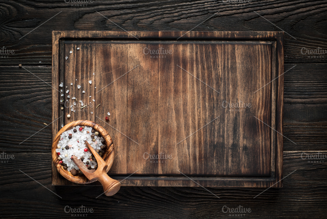 pizza cutting board at rustic wooden table Stock Photo by seregam