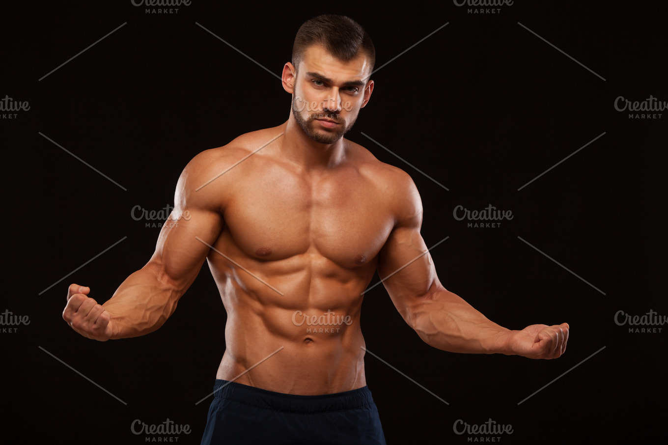 Strong athletic man fitness model torso showing six pack abs isolated ...