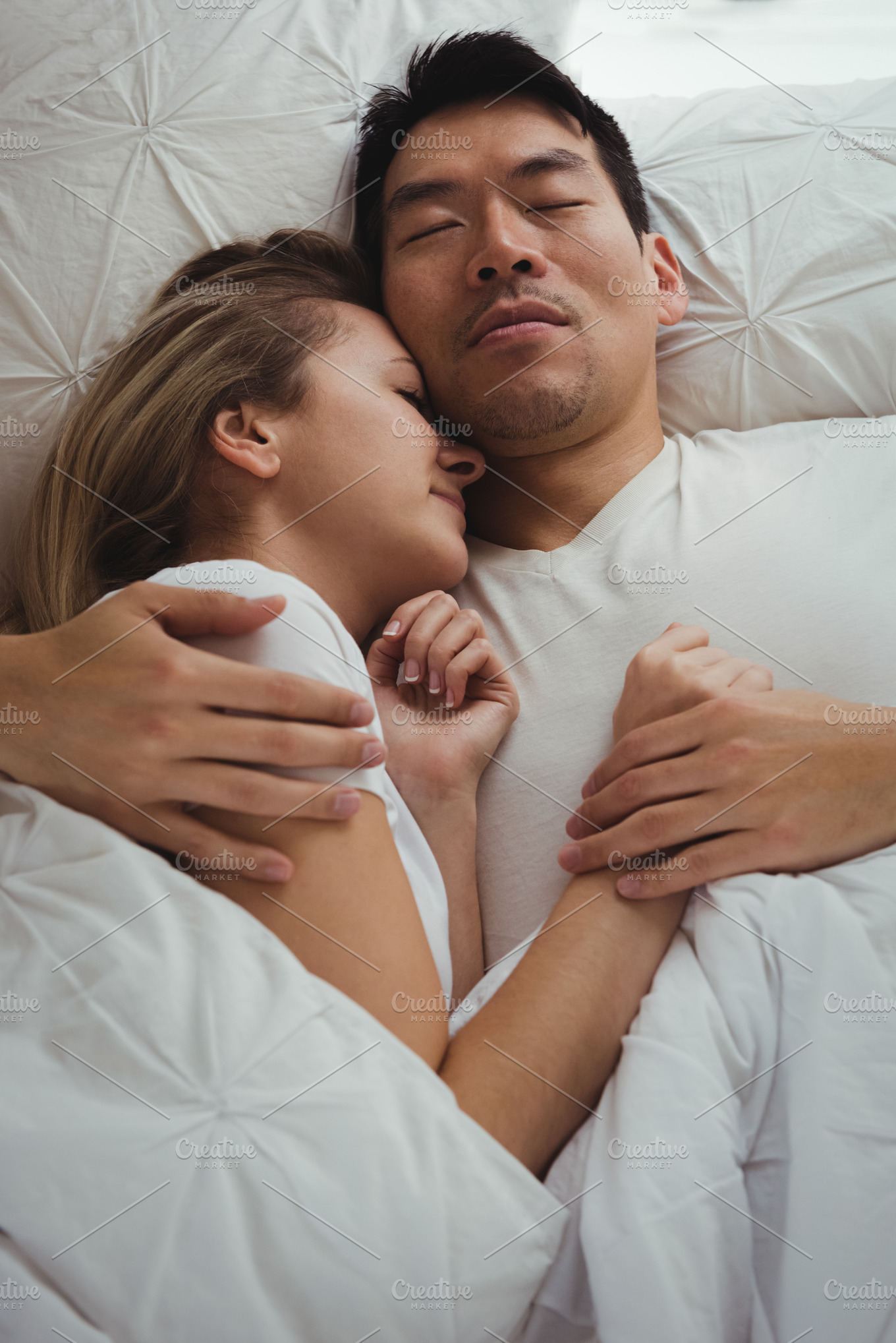 couple-sleeping-together-in-bedroom-stock-photos-creative-market