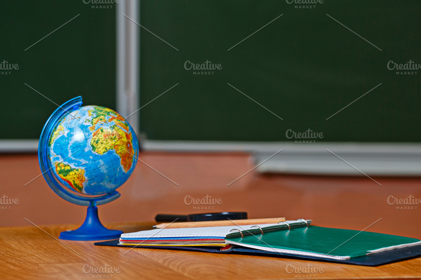 Globe And Notebook On The Desk High Quality Education Stock Photos