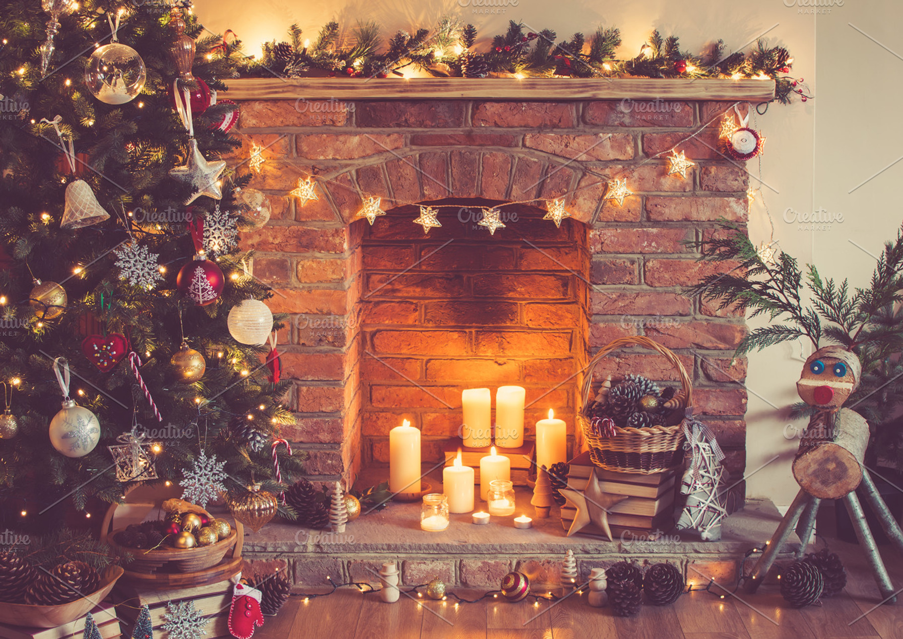 Christmas decorated fireplace candle | High-Quality Holiday Stock ...