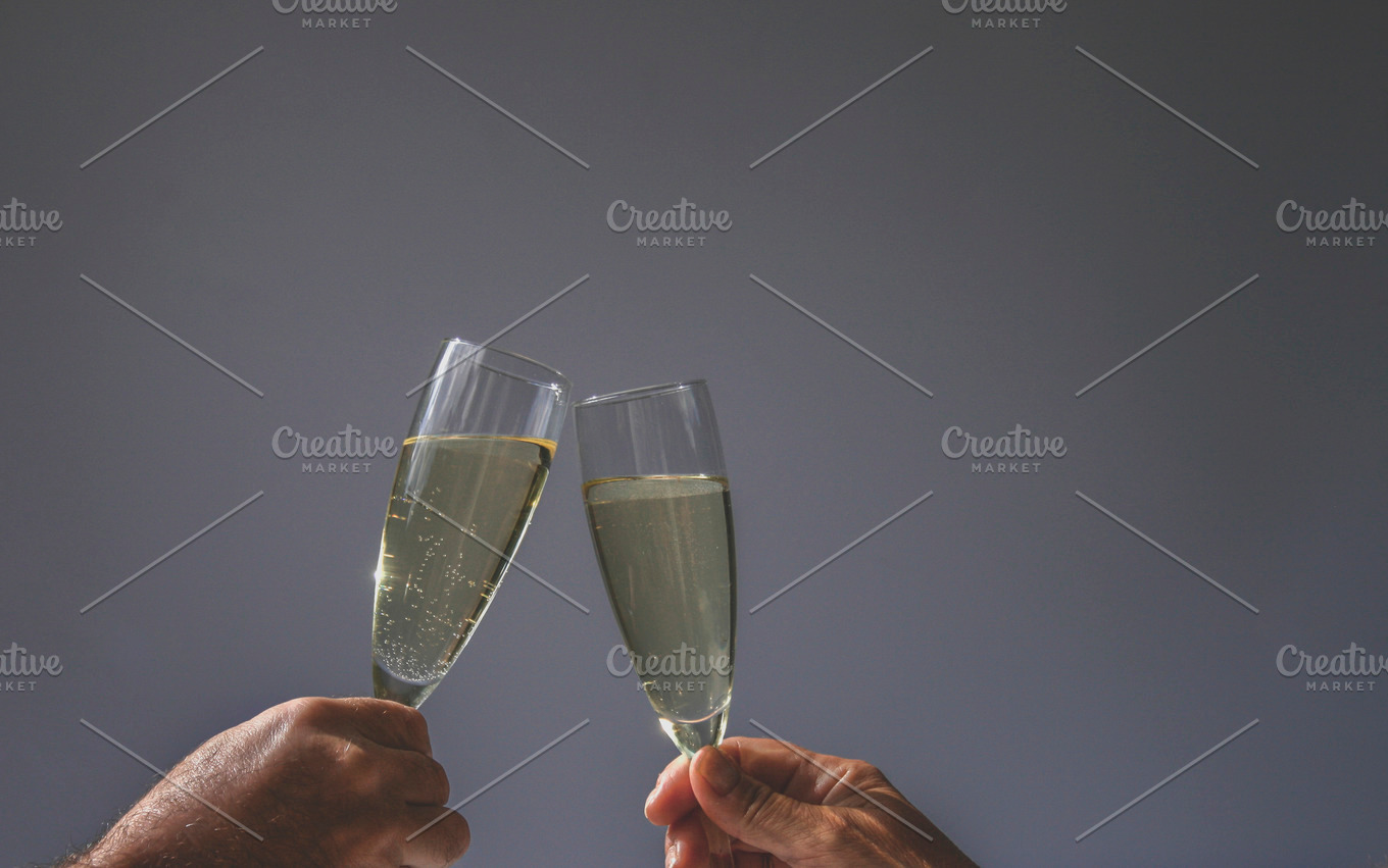 Cheers with champagne | High-Quality Holiday Stock Photos ~ Creative Market