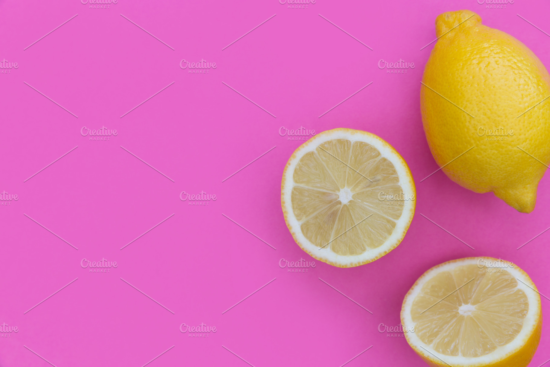 Lemons on bright pink background | Food Images ~ Creative Market