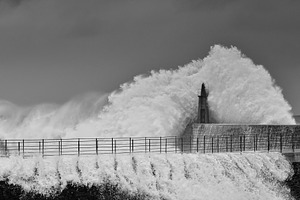 Stormy wave over old lighthouse containing lighthouse, storm, and ocean