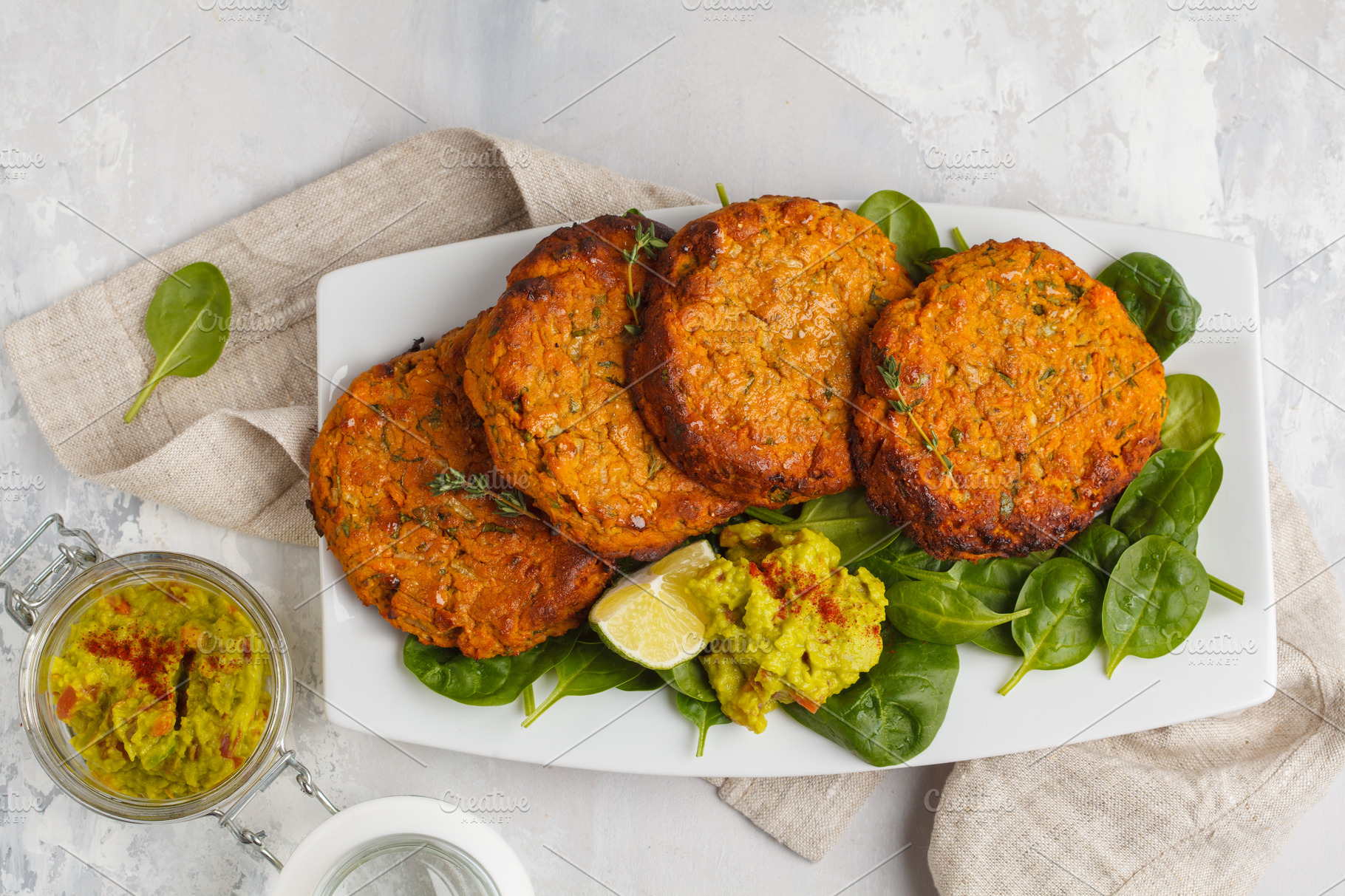 Baked sweet potato burgers containing avocado, beans, and bowl | Food ...