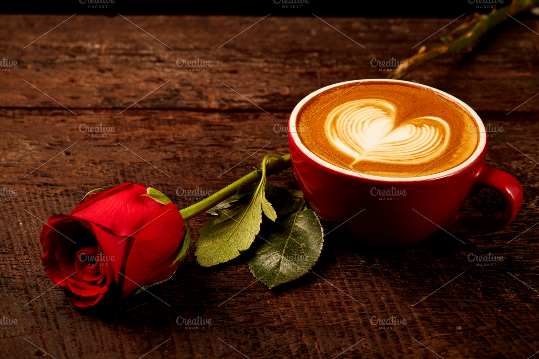 cappuccino with red rose on wood tab | Background Stock Photos