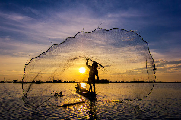 Fishermen throwing net fishing stock photo containing human and ...