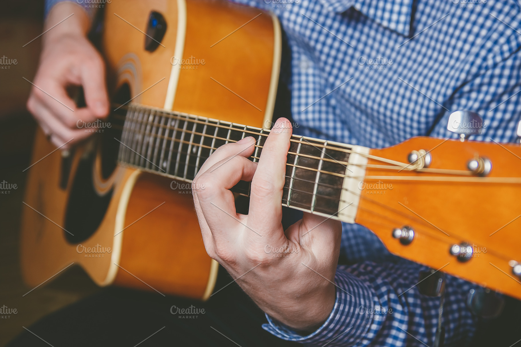 Close Up Of Guitarist Hand Playing Guitar Containing Acoustic Guitar And High Quality People Images Creative Market