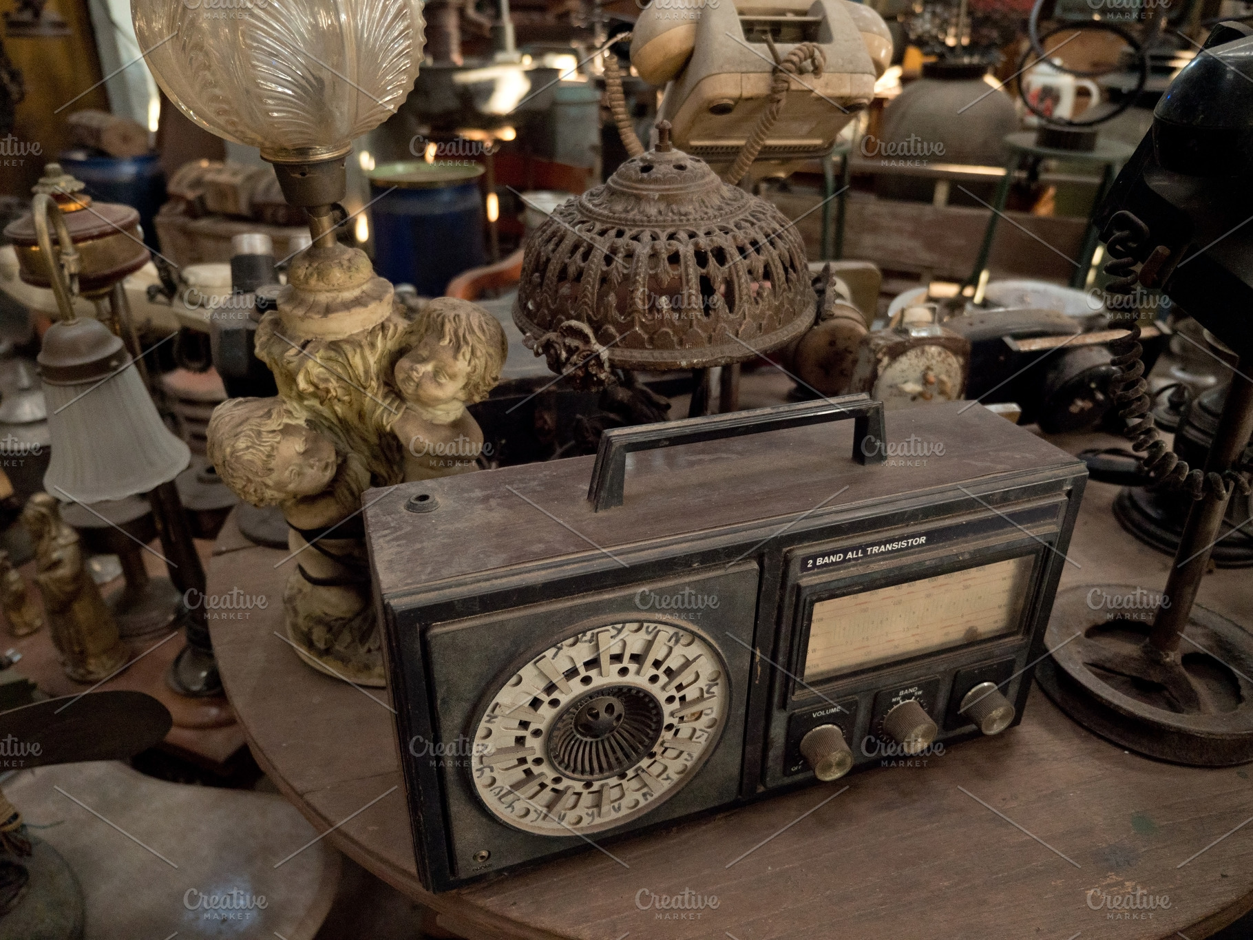 Old radio in antique shop in indonesia featuring lamp, old, and radio