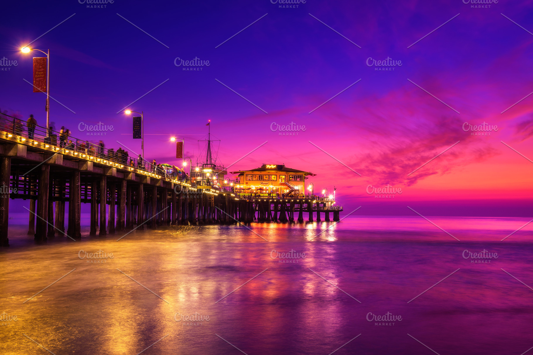 sunset-with-many-tourists-at-santa-monica-pier-in-los-angeles