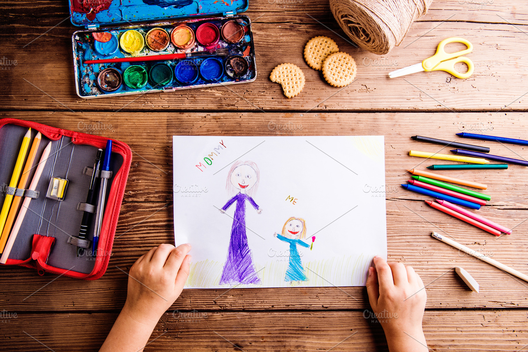 Unrecognizable girl drawing picture of her and her mother | Holiday ...