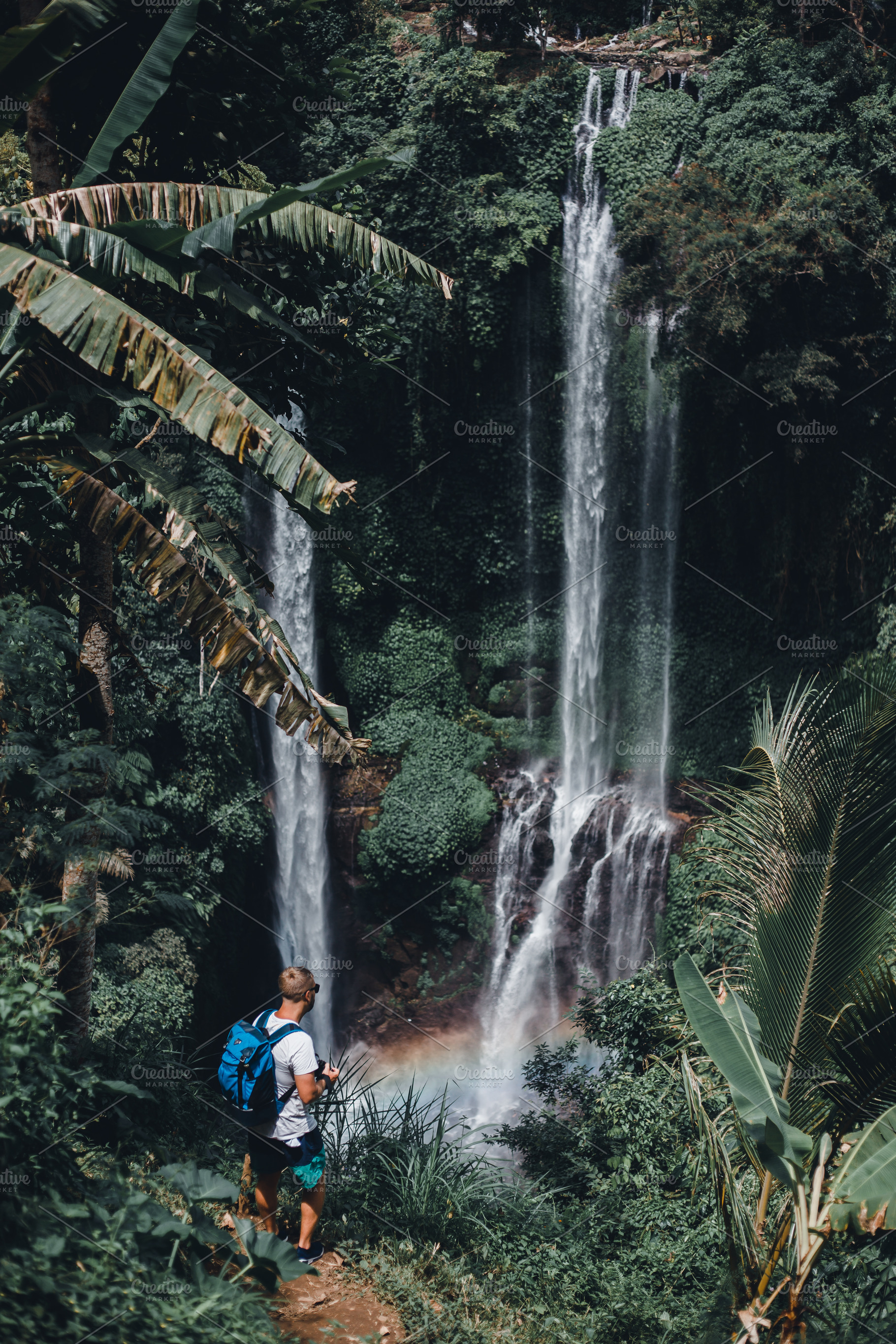 Handsome man posing on waterfall stock photo containing man and travel ...