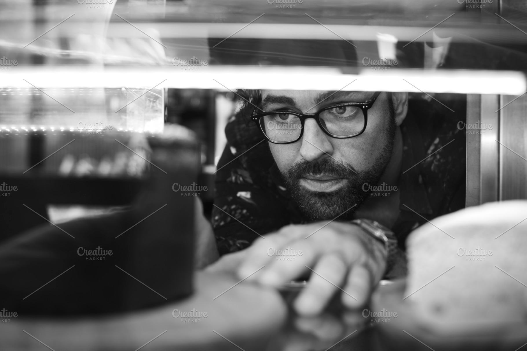 man-getting-cake-out-of-the-fridge-stock-photos-creative-market