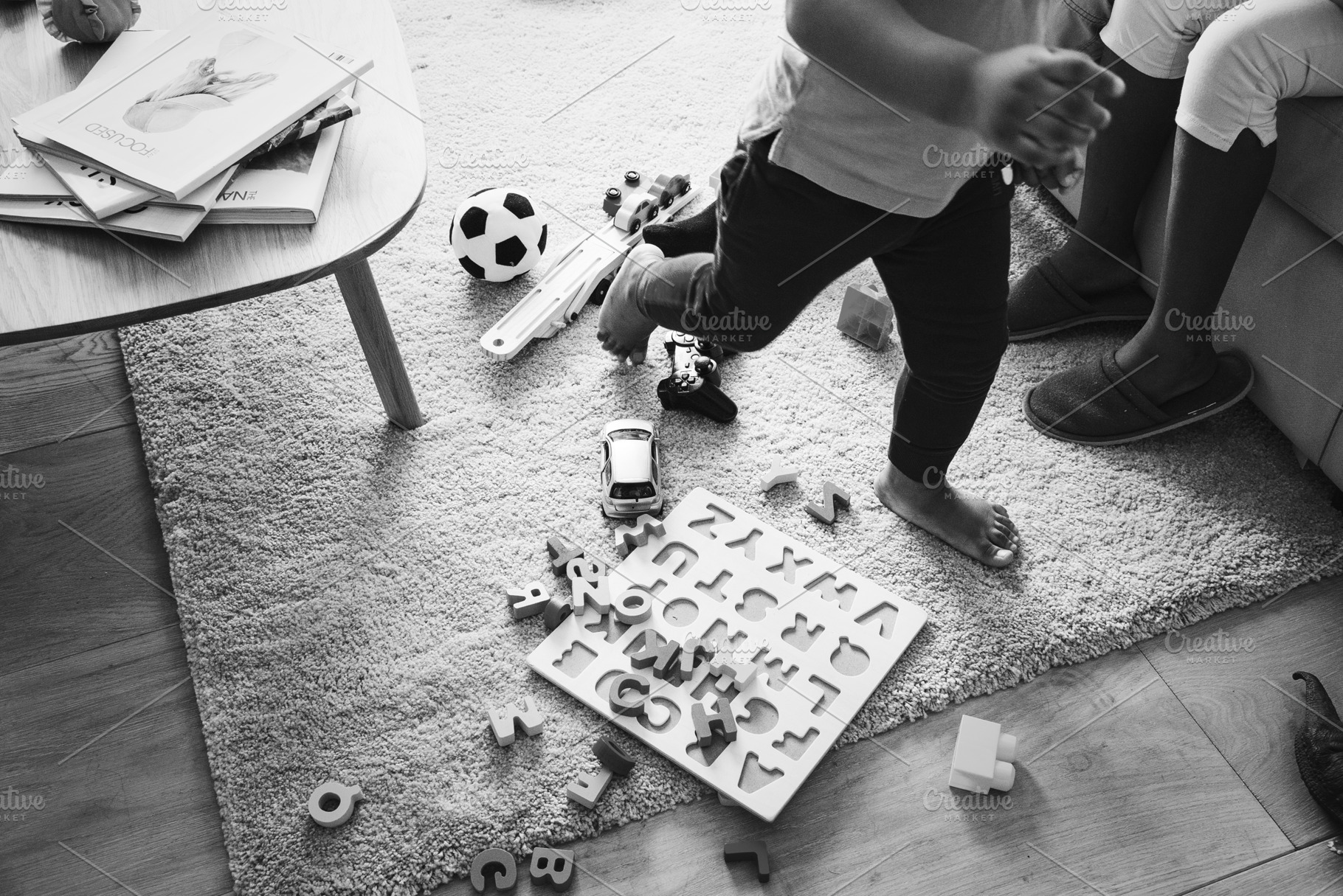 kids-play-with-toys-in-living-room-stock-photos-creative-market