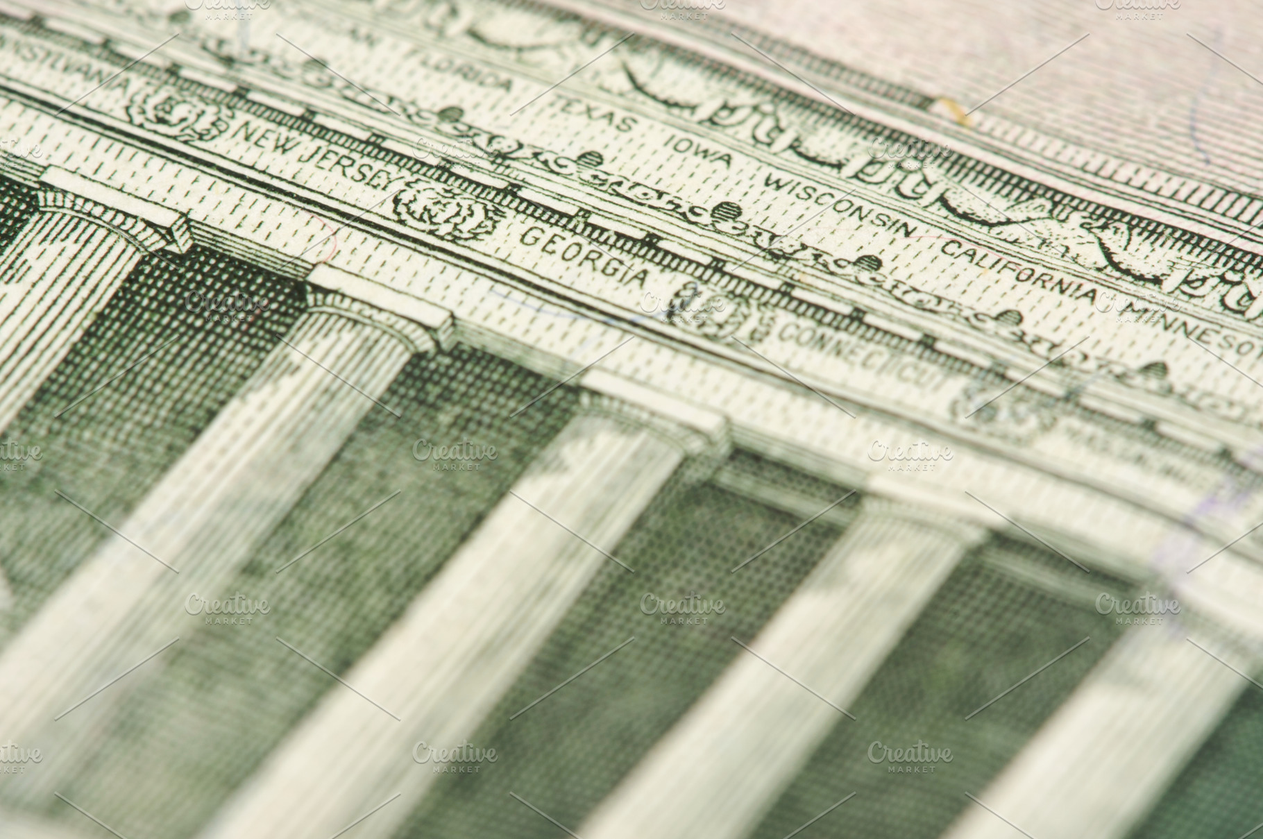 macro-of-the-back-of-the-us-five-dollar-bill-showing-small-state-names