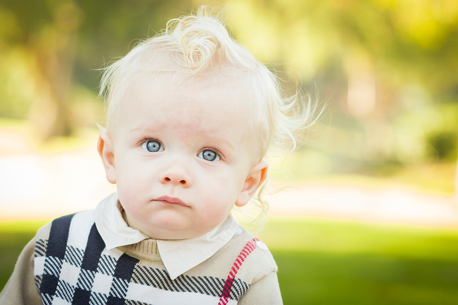 Pretty Caucasian Baby Boy With Blonde Hair Sweeps The Yard With A Broom  Stock Photo - Download Image Now - iStock