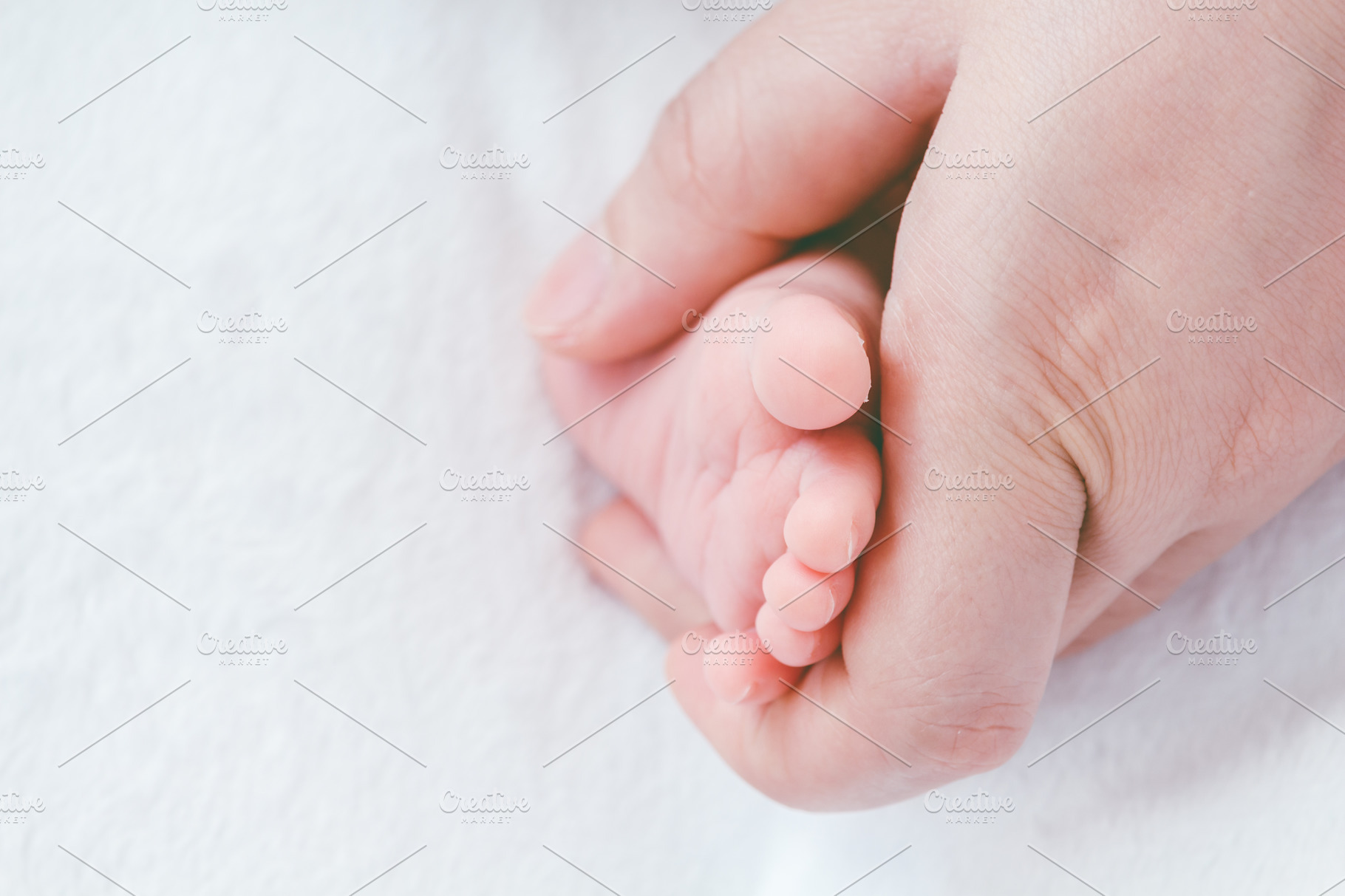 Download Newborn Baby Feet On Mother Hands Containing Adult Aid And Arm High Quality People Images Creative Market