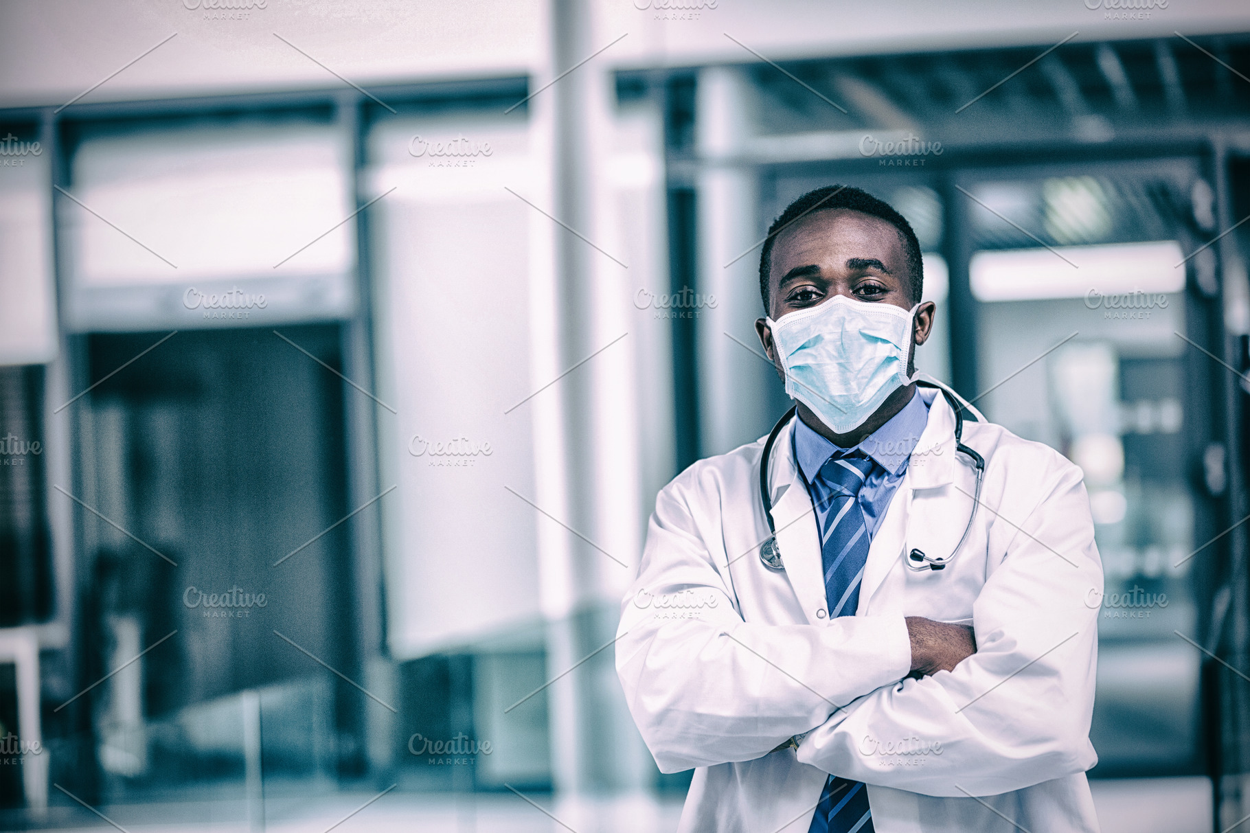 Doctor wearing surgical mask HighQuality Stock Photos Creative Market