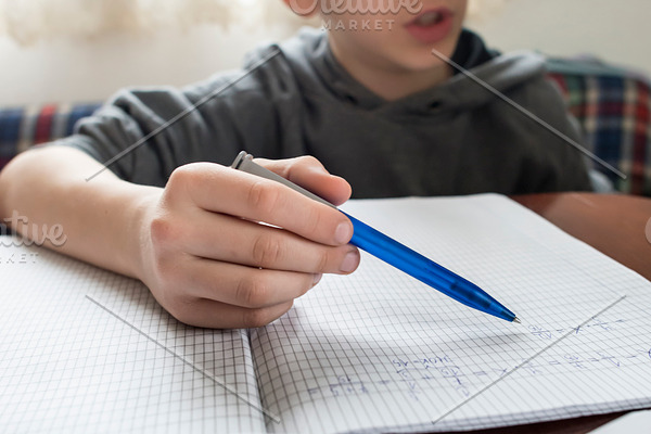 Boy do his homework stock photo containing homework and boy | High