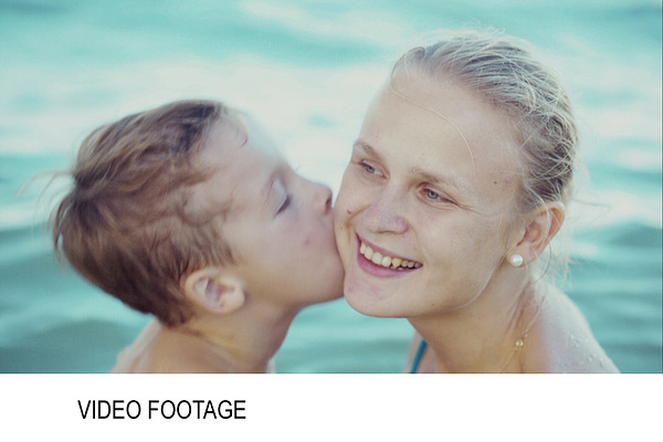 Boy kissing mother while bathing | High-Quality People ...