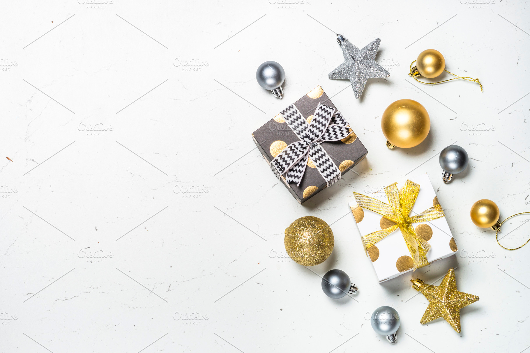 Christmas background with gold and silver decorations on black Stock Photo  by Nadianb