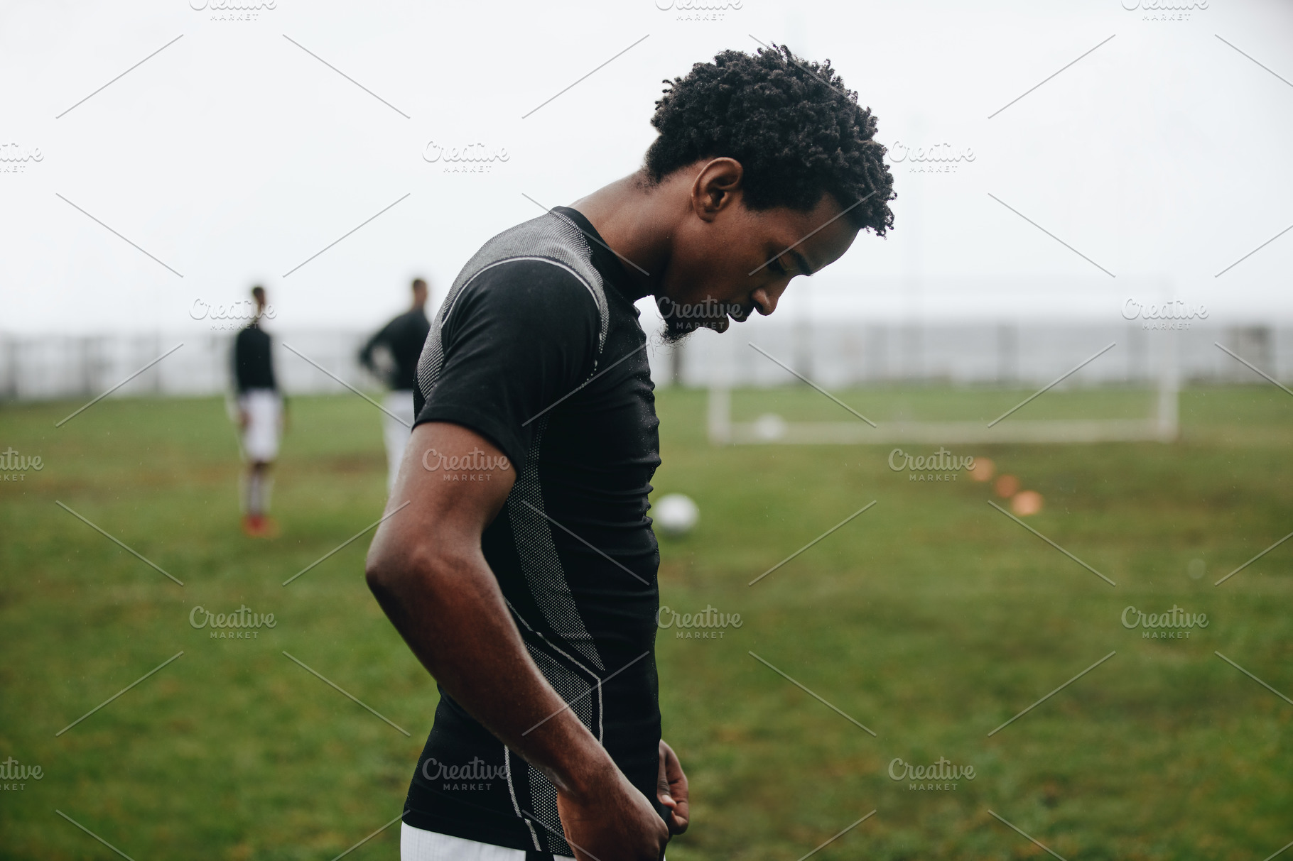 Close Up Of A Soccer Player Standing High Quality Sports Stock Photos Creative Market