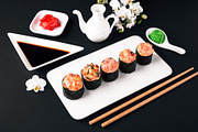 Gunkan Maki Sushi of fish salmon, scallop, perch, eel, shrimp and