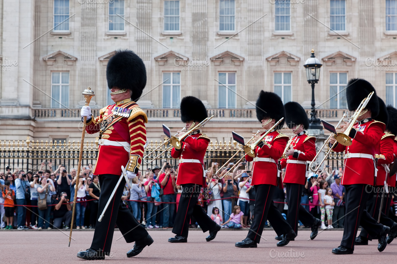 Queen's guard change london containing buckingham palace, palace, and