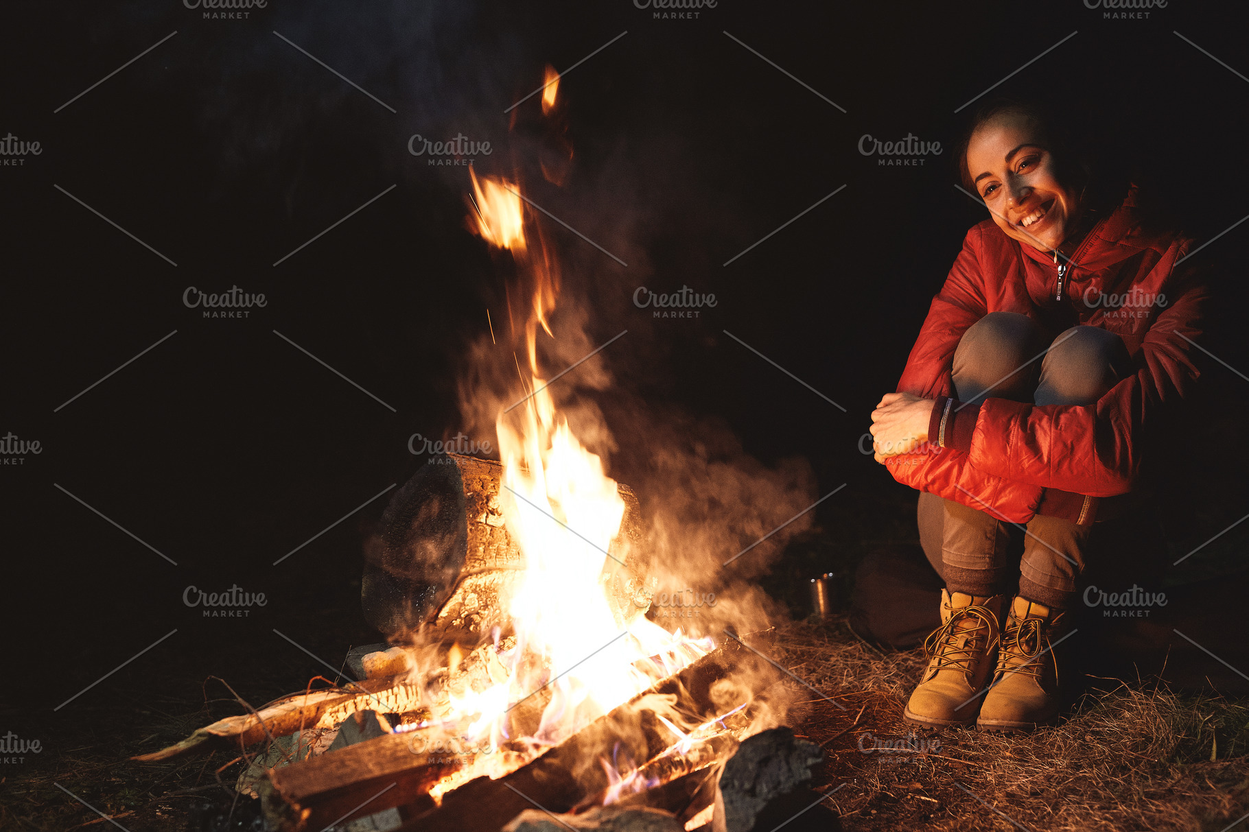 Young Woman In Sitting Near The Featuring Woman Girl And Campfire High Quality People Images 5606